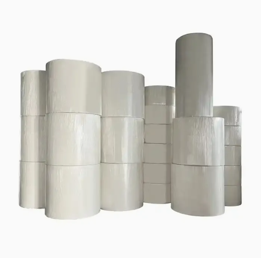 tissue jumbo rolls in different widths and diameters stacked
